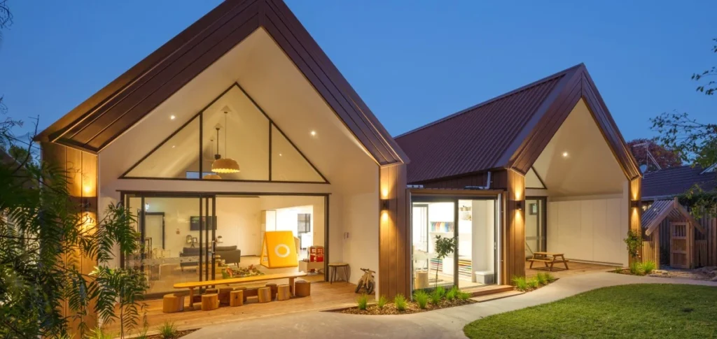 Modern home with architectural Lux Wood Maple steel roofing and cladding, combining sleek design with durability.