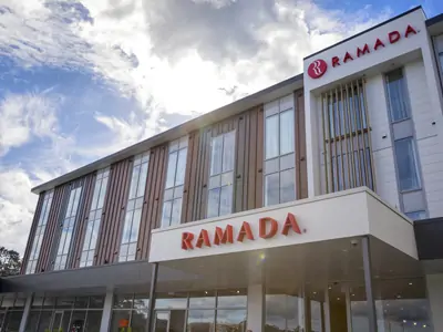 Ramada hotel featuring modern architectural design with steel roofing and steel cladding.