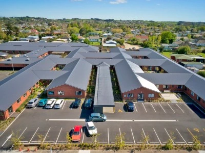 A large retirement home featuring durable steel roofing for long-lasting protection and energy efficiency.