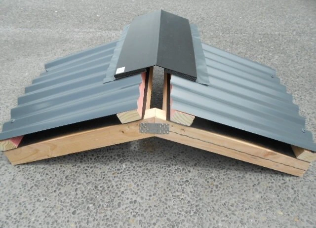 Ridge Vent (RV10P) with adhesive aluminum flashing for passive roof ventilation.