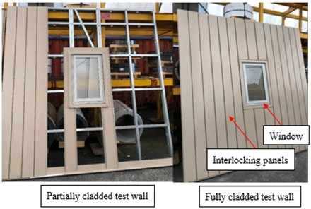 Partially and fully cladded test walls featuring interlocking panels and a central window for wind resistance evaluation.