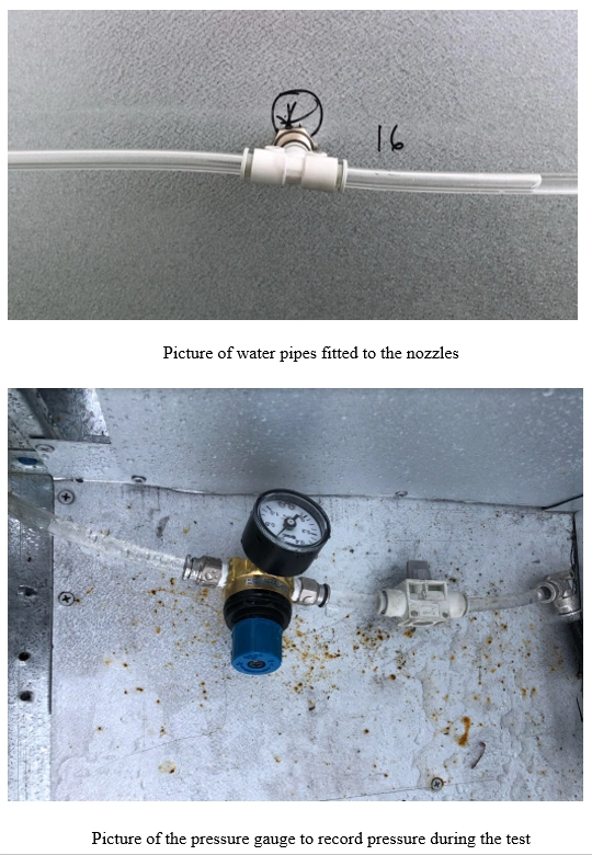 Water pipes connected to spray nozzles and a pressure gauge used to measure air pressure during testing.